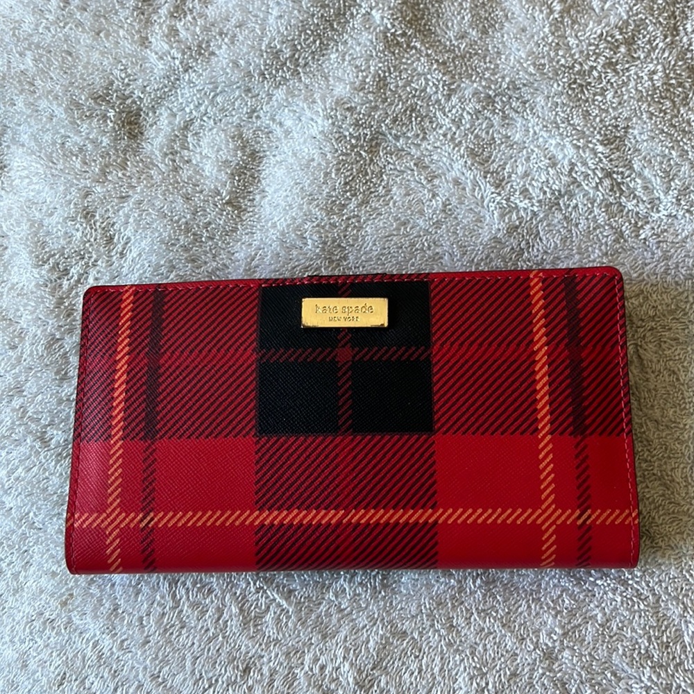 Black and plaid Kate spade wallet.
